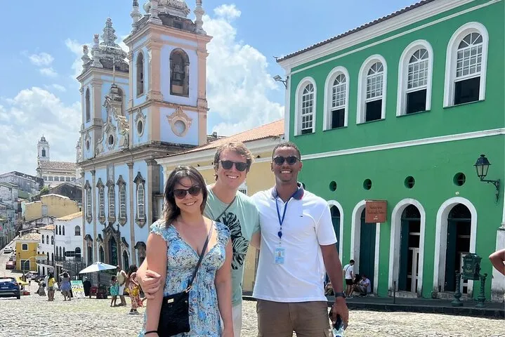 Our guide with two travelers in Pelourinho